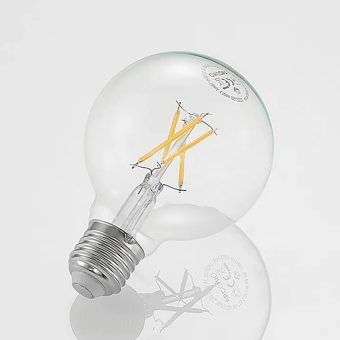 Arcchio Leuchtmittel -  - Klare LED-Glühbirne aus Glas mit sichtbaren Filament-LEDs und einem metallischen Schraubsockel.