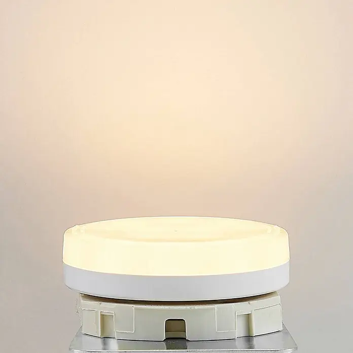 Arcchio Leuchtmittel -  - Runde weiße LED-Leuchte mit warmem Licht auf der Montagebasis.