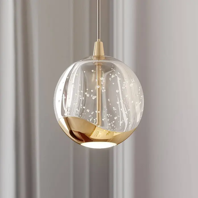 Lucande LED Pendelleuchte in transparent, gold, Hängelampe -  - Sphärische Pendelleuchte aus klarem, blasigem Glas mit goldenem Metallsockel, strahlt Licht nach unten ab.