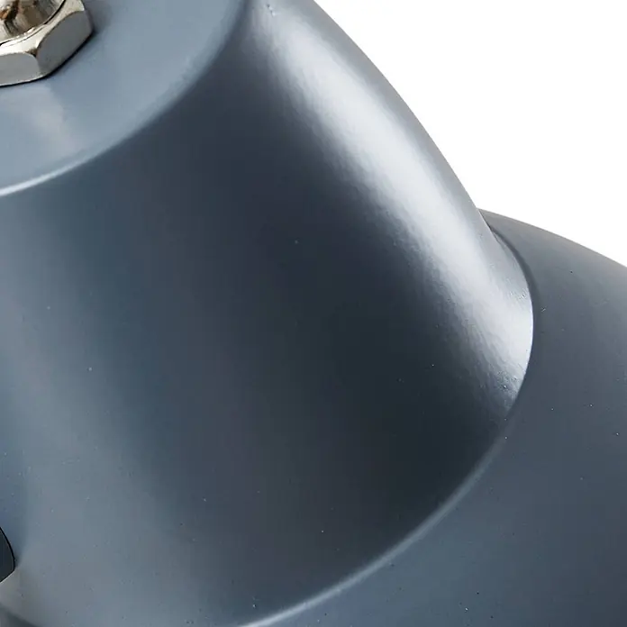 Lindby Stehlampe Wohnzimmer in grau, Stehleuchte -  - Dunkelgraue, glänzende Metalloberfläche mit einer silbernen Sechskantmutter oben links.