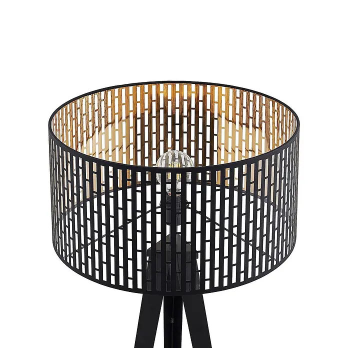 Lindby Stehlampe Dreibein schwarz gold mit Fußschalter, ohne Leuchtmittel -  - Schwarze Metalllampe mit zylindrischem Lamellenschirm, goldener Innenseite und freiliegender Glühbirne.
