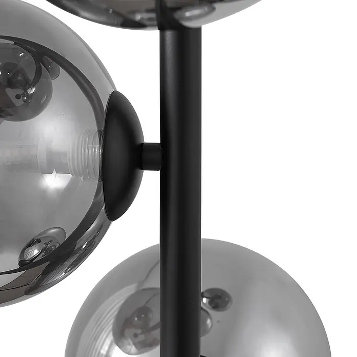 Lindby Stehlampe Wohnzimmer in schwarz, Stehleuchte -  - Moderne Lampe mit schwarzem Metallständer und rauchgrauen Glaskugelschirmchen, mit sichtbaren Glühbirnen.