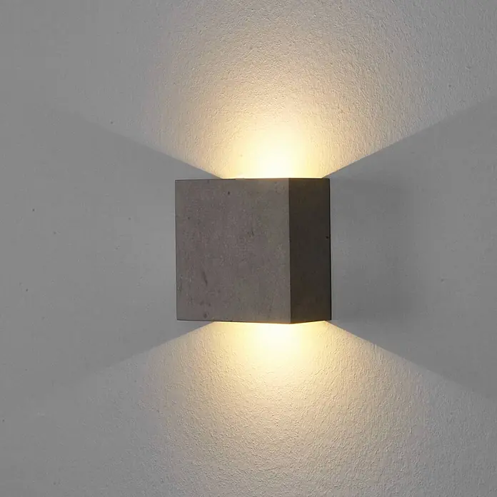 Lindby Wandleuchte Yva - alu / grau / zink - Dunkelgraue Beton-Wandleuchte, die Licht nach oben und unten abgibt.