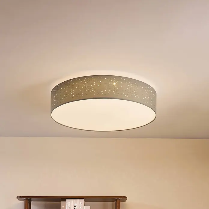 Lindby Deckenleuchte Ellamina - alu / grau / zink - Graue Stoff-Deckenleuchte mit Sternausschnitten, an der Decke montiert.