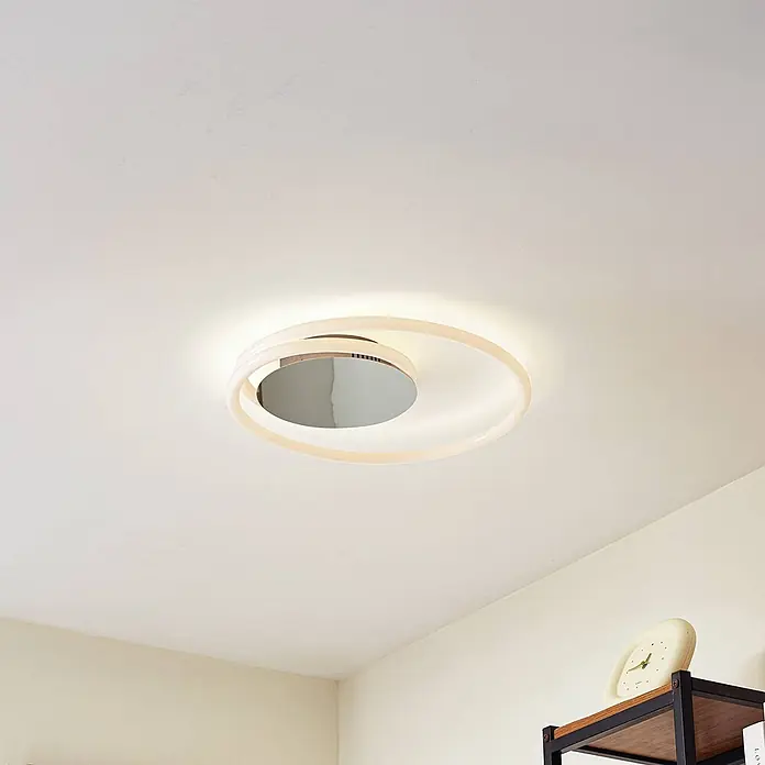Lucande Deckenleuchte Valenora - weiß / opal - Moderne weiße spiralförmige Deckenleuchte mit reflektierender silberner Mitte, die ein weiches Licht wirft.