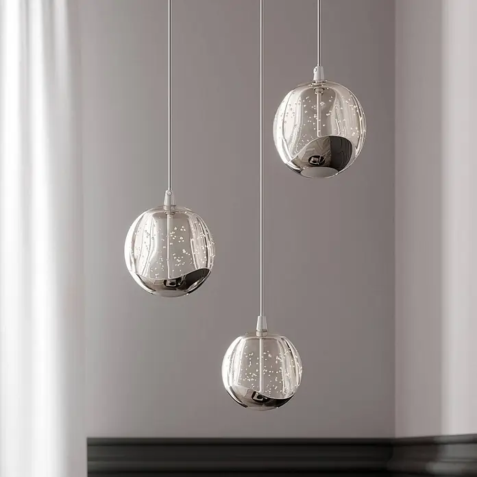 Lucande Pendelleuchte Hayley - klar / transparent, klar, chrom - Drei kugelförmige Pendelleuchten aus verspiegeltem Glas mit eingebetteten Bläschen.