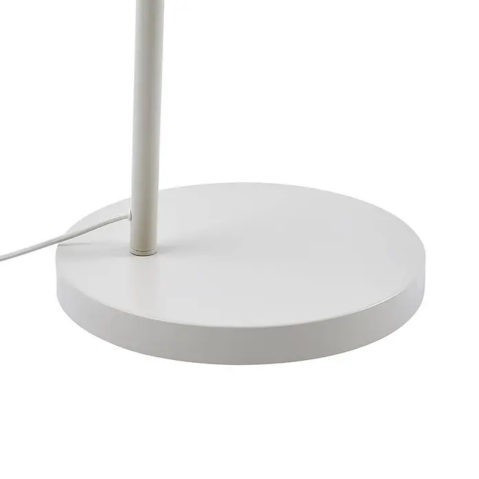 Lindby Stehleuchte Valdorin - creme / amber, creme / amber, E27 - Weißer runder Stehlampenfuß mit zentralem Mast und seitlich austretendem Netzkabel.