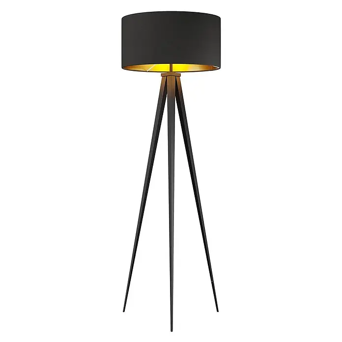Lindby Stehlampe Dreibein schwarz gold mit Fußschalter, ohne Leuchtmittel -  - Elegante schwarze Stehleuchte mit zylindrischem Schirm und goldener Innenseite, gestützt von einem schlanken schwarzen Dreibeingestell.