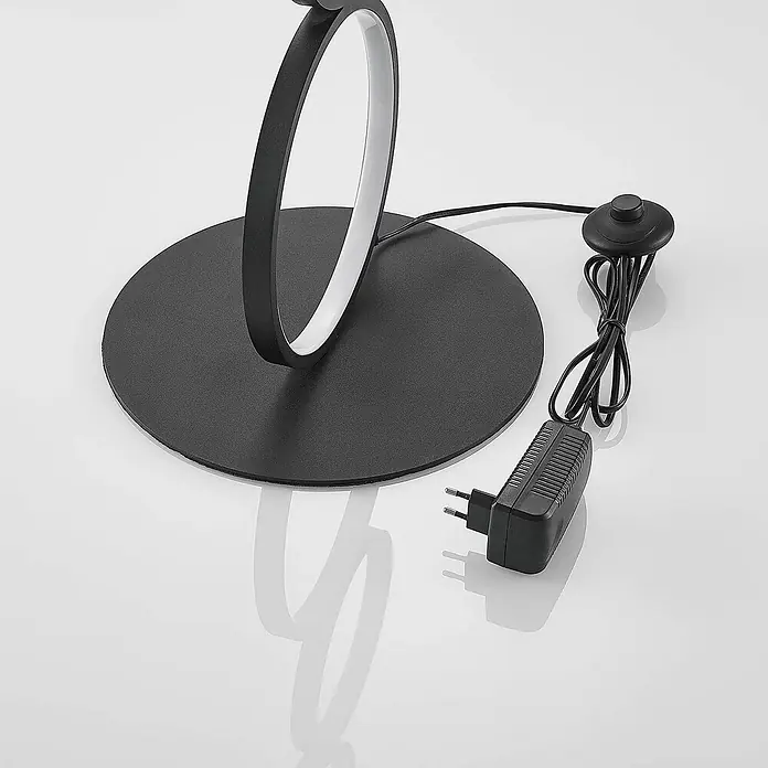 Lindby LED Stehlampe Wohnzimmer in schwarz, Stehleuchte -  - Schwarze runde LED-Tischleuchte mit runder Basis, Netzteil und Fußschalter.