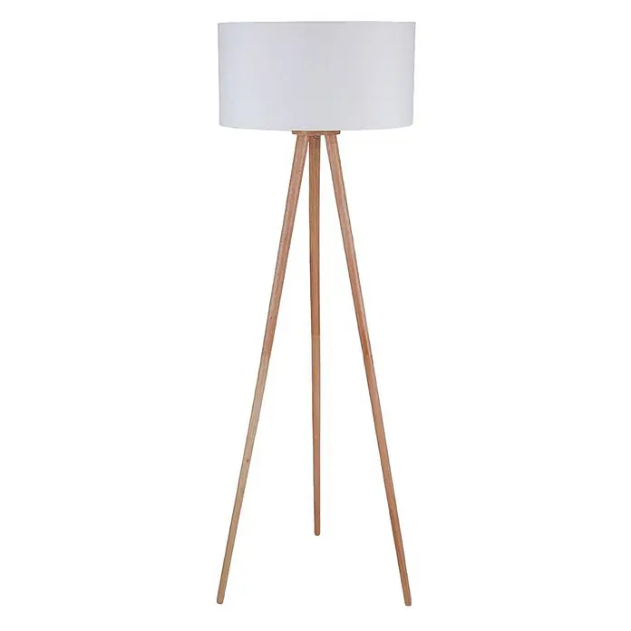 Lindby Stehlampe Dreibein Stoff weiß, Holz hell, mit Fußschalter -  - Weiße Stehlampe mit zylindrischem Stoffschirm und hellem Holzstativgestell.