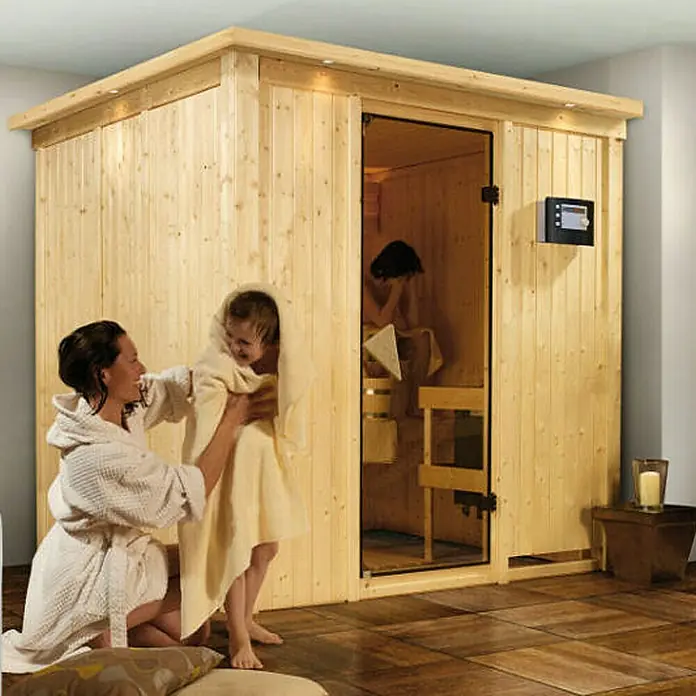 Karibu Elementsauna Sodin - Mit 9 kW Ofen mit integrierter Steuerung, Ohne Dachkranz, L x B x H: 196 x 170 x 192 cm - Holzsauna für zu Hause mit Mutter und Kind. Diese Sauna bietet Entspannung und Wellness für die ganze Familie im eigenen Heim.
