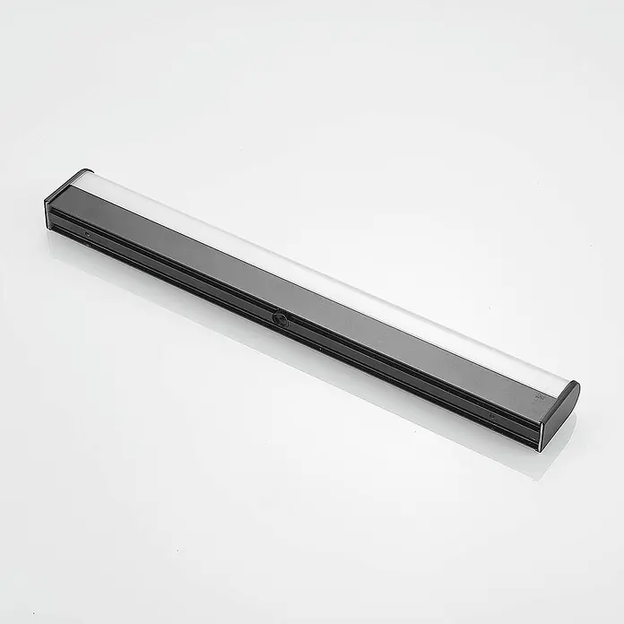 Lindby LED Wandleuchte innen in schwarz matt, weiß, Wandlampe -  - Elegante schwarze und transluzente weiße LED-Lichtleiste, ideal für Unterschrank- oder Akzentbeleuchtung, mit sichtbarem Schalter.