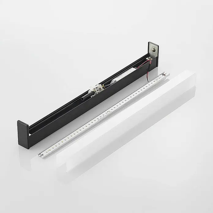 Lindby LED Wandleuchte innen in schwarz matt, weiß, Wandlampe -  - Zerlegte schwarze LED-Linearleuchte: Gehäuse, interner Treiber, LED-Streifen und weißer Diffusor gezeigt.