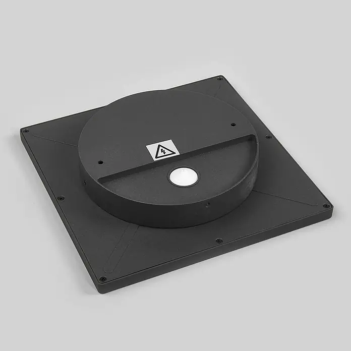 Lucande LED Outdoor Deckenlampe in anthrazit, weiß, mit Bewegungsmelder, -  - Dunkelgraue quadratische Leuchtenbasis mit erhöhtem Rundteil, Warnsymbol und weißem Sensor/LED.