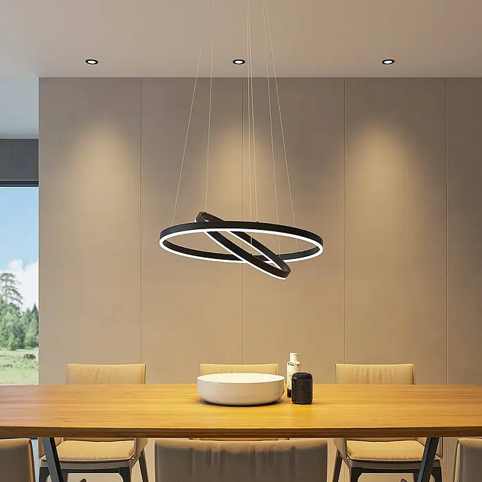 Arcchio LED Pendelleuchte in schwarz, weiß, Hängelampe -  - Moderne schwarze LED-Pendelleuchte mit zwei ineinandergreifenden Ringen über Esstisch.