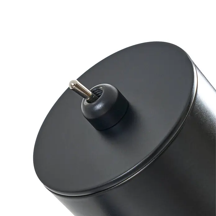 Lindby Stehlampe Wohnzimmer in schwarz, Stehleuchte -  - Schwarzes zylindrisches Bauteil mit einem silbernen Metallstift-Anschluss auf der Oberseite.