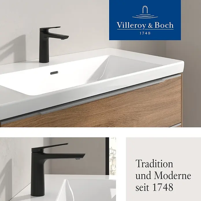 Villeroy & Boch Waschtischarmatur - Matt Black, Matt - Weißes Keramikwaschbecken mit matt-schwarzem Wasserhahn auf einem Holzwaschtisch.