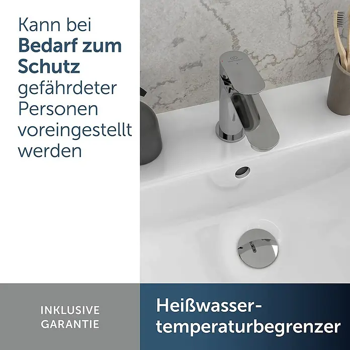 Ideal Standard Waschtischarmatur - Chrom, Hochglänzend - Verchromte Armatur mit Heißwasser-temperaturbegrenzer auf weißem Waschbecken.