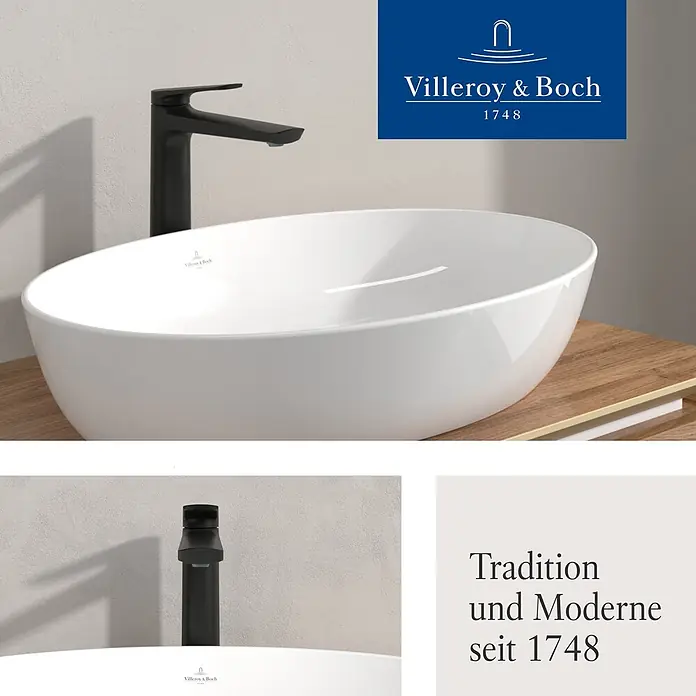 Villeroy & Boch Waschtischarmatur - Matt Black, Matt - Weißes ovales Aufsatzwaschbecken mit schwarzem Wasserhahn auf einem Holzwaschtisch.