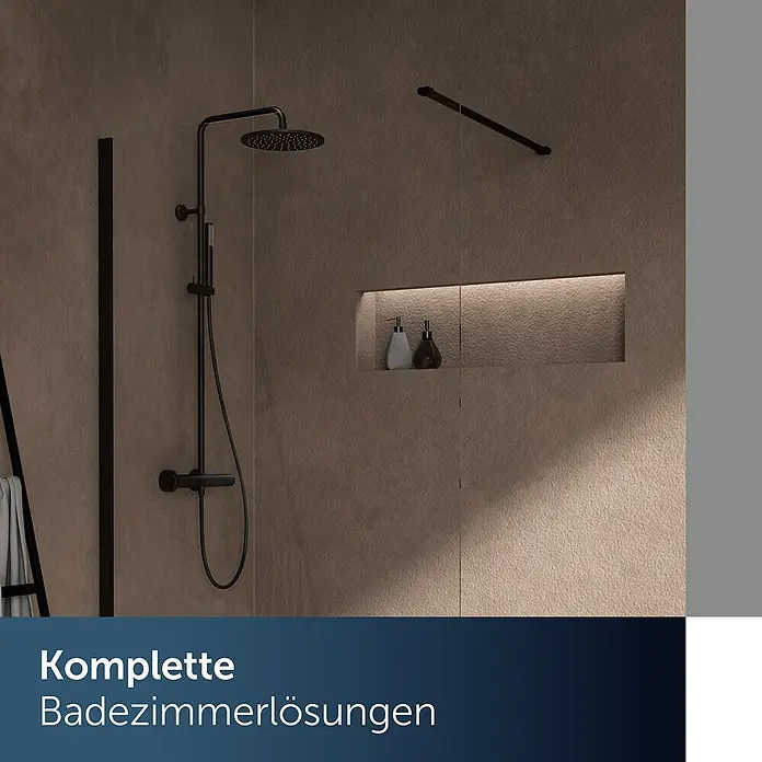 Ideal Standard Duschsystem - Anzahl Strahlarten: 2 Stk., Matt Schwarz - Eine moderne Duschkabine mit schwarzer Regendusche, Handbrause und Armatur. Eine Nische enthält zwei Seifenspender.