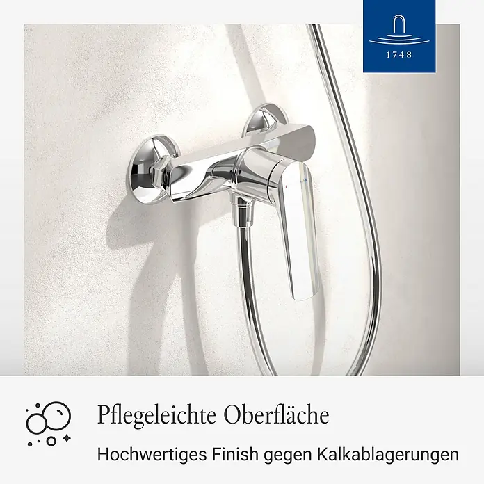 Villeroy & Boch Duschsystem - Anzahl Strahlarten: 3 Stk., Chrom - Verchromte Duscharmatur mit Einhebelmischer und Duschschlauch, an der Wand montiert.