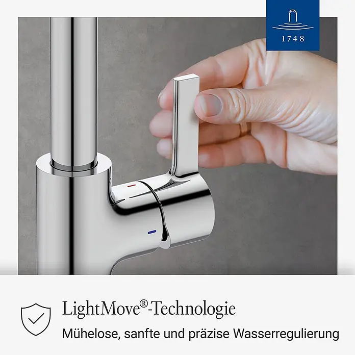 Villeroy & Boch Spültischarmatur - Chrom, Hochglänzend - Glänzender Chromwasserhahn mit schlankem Griff, der von einer Hand bedient wird, zeigt rote und blaue Anzeigen für die Wassertemperaturregelung.
