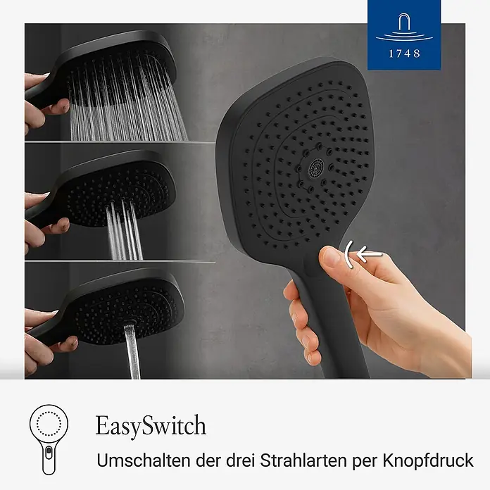 Villeroy & Boch Brausegarnitur - Art Strahl: Mix-Strahl, Matt Black - Schwarzer Duschkopf mit drei demonstrierten Strahlarten. Eine Hand drückt den EasySwitch-Knopf, um die Strahlarten zu wechseln.
