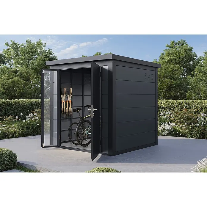 Wolff Finnhaus Gartenhaus Ulrik Prime Line - Außenmaß inkl. Dachüberstand (B x T): 210 x 220 cm, Metall, Felsgrau - Anthrazitfarbener Gartenschuppen aus Metall mit offenen Türen, zeigt ein Fahrrad und Gartengeräte im Inneren, auf einer Terrasse.