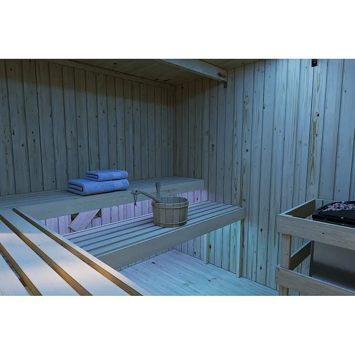 Karibu Saunahaus Tim - Ohne Ofen, Schwarz, L x B x H: 224 x 219,5 x 196 cm - Helles Sauna-Interieur aus Holz mit blauer Beleuchtung, Handtüchern, Holzeimer und Saunaofen.