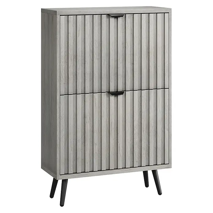 SONNENH Schuhschrank mit 2 Klappen und Rillenfront, Grau -  - Helle graue Kommode in Holzoptik mit gerippter Front, zwei Schubladen mit schwarzen Griffen und schwarzen, spitz zulaufenden Beinen.