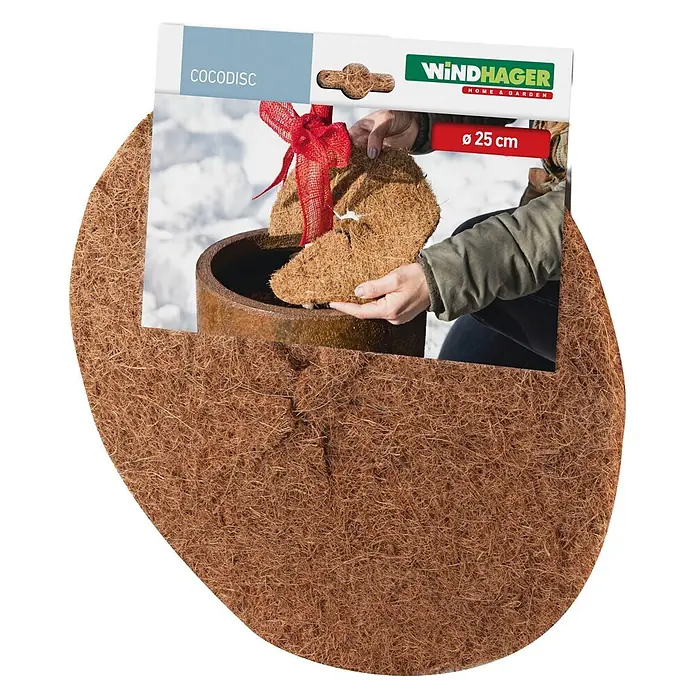 Windhager Kokosmulchscheibe Cocodisc - Durchmesser: 25 cm, Natur - Braune Kokosfaser-Cocodisk (Ø 25 cm) wird in einen Blumentopf gelegt, wie auf der Verpackung gezeigt.
