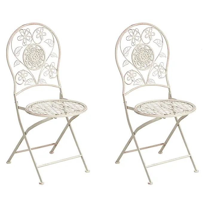 2er-Set Gartenstuhl YAVIZA in Beige -  - Zwei weiße Klappstühle aus Metall im Used-Look mit Blumenmuster und Gitterrosten.