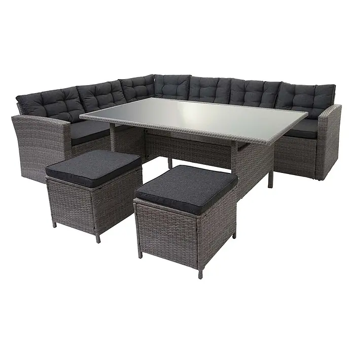 Mendler Loungemöbel-Set HWC-A29 - 5 -tlg., Polyrattan, Grau, Kissen grau + 2x Hocker, Grau - Graue Rattan-Gartengarnitur mit L-förmigem Ecksofa, Glastisch und zwei dunkelgrauen Hocker mit Kissen.