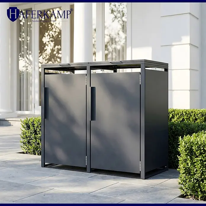 HAFERKAMP Mülltonnenbox 2er KUBUS HxBxT 116x134x80 cm für 2x 240-Liter-Tonnen Verzinkter Stahl Anthrazit -  - Eine schlanke, dunkelgraue Mülltonnenbox aus Metall mit zwei Fächern, für den Außenbereich auf einer Terrasse.