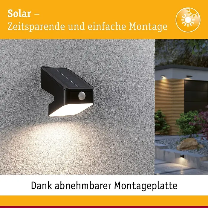 Paulmann Solarleuchte Lesly - Lichtfarbe: Warmweiß, LED, Höhe: 138 mm - Schwarze Solar-Wandleuchte mit Bewegungssensor an grauer Strukturwand, beleuchtet den Bereich darunter.