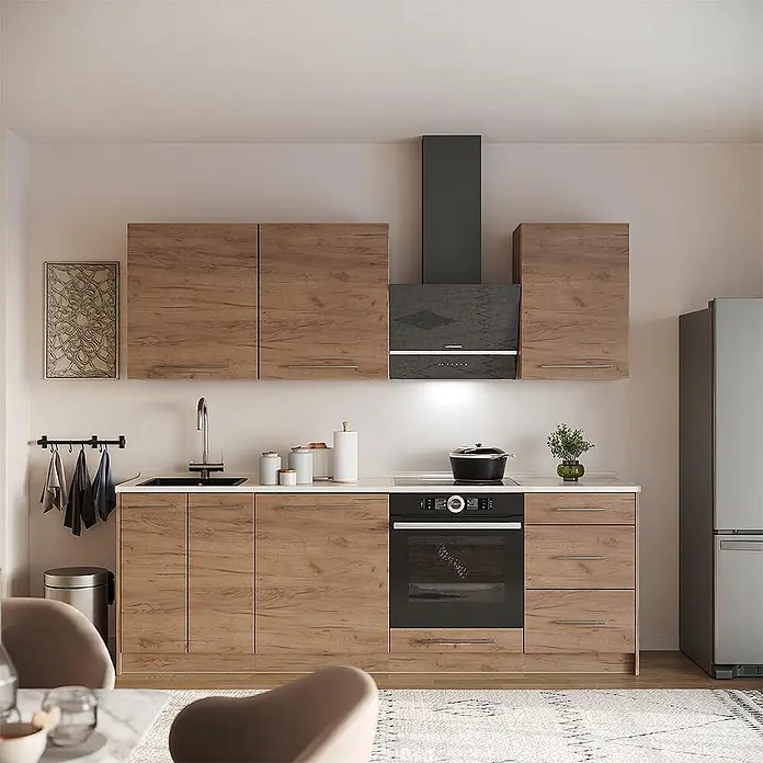 Vicco Küchenzeile - Breite: 230 cm, Goldkraft Eiche, Ohne Elektrogeräte - Moderne Küche mit braunen Holzoptik-Schränken, dunkelgrauem Backofen und Dunstabzugshaube, zeigt ein funktionales und stilvolles Interieur.