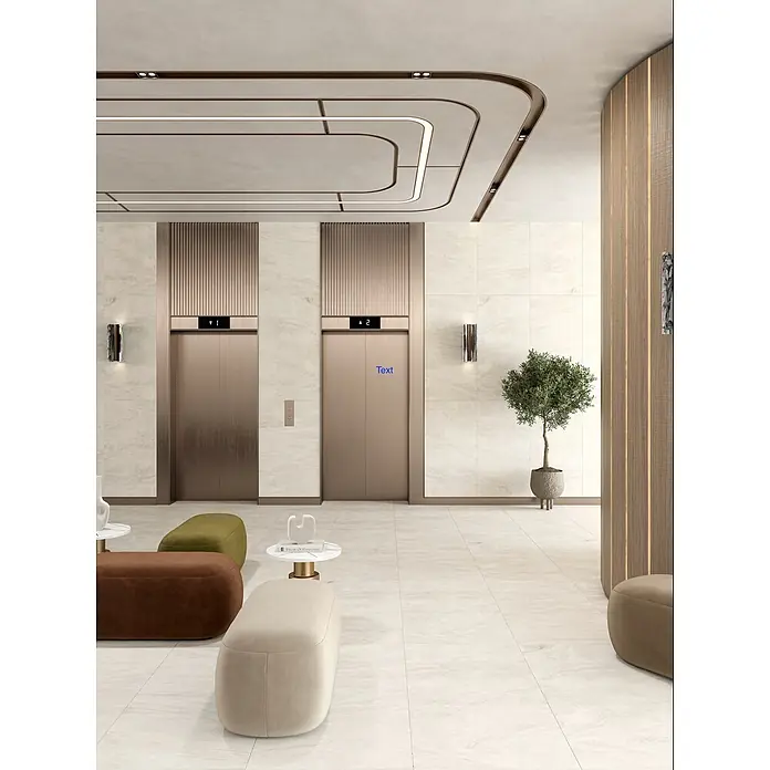 Feinsteinzeugfliese COSMIC BONE – 60 x 120 cm, Marmoroptik, Mat -  - Moderne Lobby mit zwei Bronzefahrstühlen, plüschigen Hockern in Beige, Braun und Olivgrün und linearer Deckenbeleuchtung vor hellen Marmorwänden und -boden.