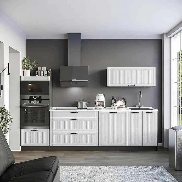 Vicco Küchenzeile - Breite: 280 cm, Weiß Landhaus, Ohne Elektrogeräte - Weiße Küchenschränke und Schubladen mit schwarzen Griffen, integriert in eine moderne Küche.