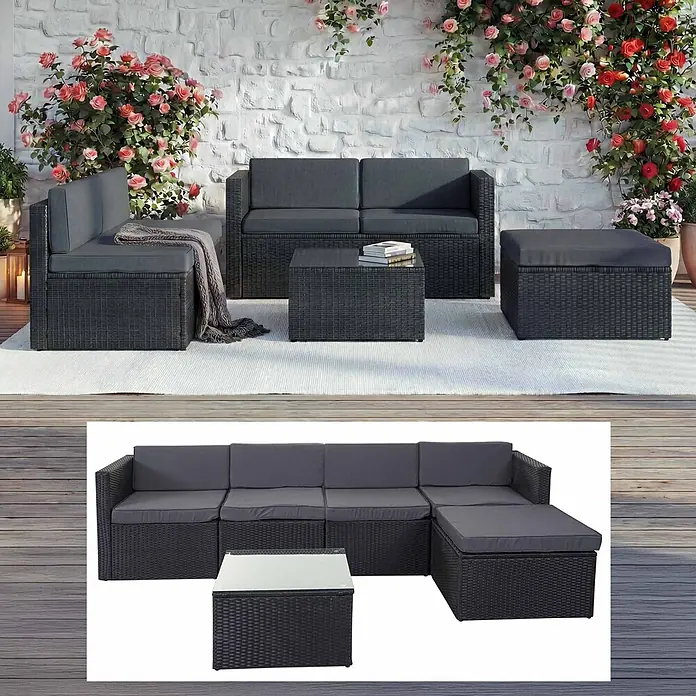 Mendler Poly-Rattan-Garnitur HWC-D24 - anthrazit, Polster dunkelgrau -  - Dunkelgraue Rattan-Gartenmöbelgarnitur mit Kissen, Couchtisch und Ottomane auf einer Terrasse.