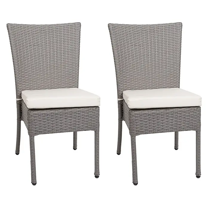 Mendler 2er-Set Poly-Rattan Stuhl HWC-G19 - grau, Kissen Creme -  - Zwei graue Rattan-Esszimmerstühle mit weißen Sitzkissen.
