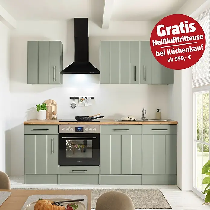 Respekta Küchenzeile Anton Typ 1 - Breite: 220 cm, Schilfgrün, Mit Elektrogeräten - Moderne Küchenzeile mit hellgrünen Schränken, Holzplatte, integriertem Ofen, Kochfeld, Spüle und schwarzer Dunstabzugshaube.