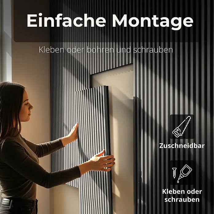 Dalsys Akustikpaneel 4x 120 x 60cm Grau - Grau - Frau installiert gestreifte schwarz-weiße Schallschutzwand. Betont einfache Montage und Zuschnitt.