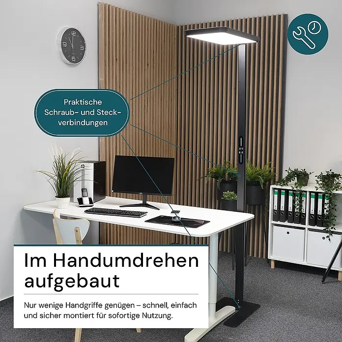 LUXULA LED Stehleuchte 100 W 4000 K neutralweiß schwarz dimmbar -  - Ein höhenverstellbarer weißer Schreibtisch mit moderner schwarzer Stehleuchte in einem Büro, der die einfache Montage hervorhebt.