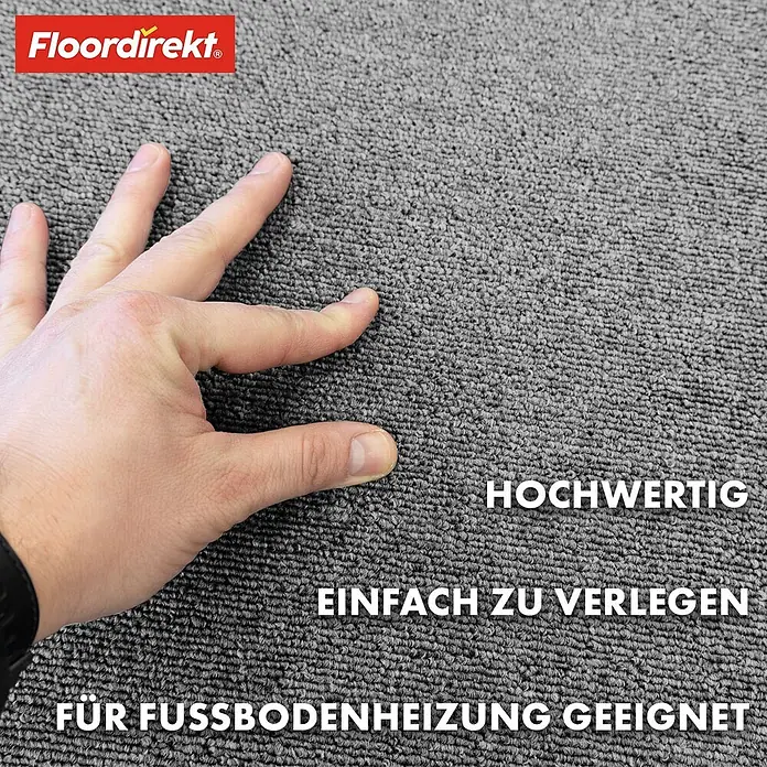 Floordirekt Teppichfliese Moscow 50 x 50 cm Grau -  - Grauer Strukturteppich, eine Hand berührt die Oberfläche. Hochwertig, leicht zu verlegen, für Fußbodenheizung geeignet.