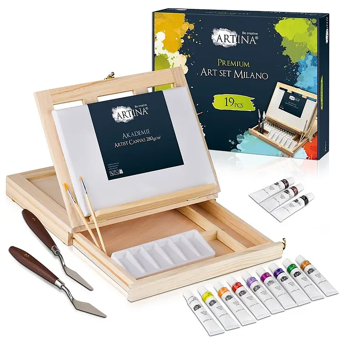 19tlg Acrylfarben Set mit Tischstaffelei & Malkoffer Milano -  - Ein hölzerner Malkasten entfaltet sich zu einer Staffelei, zeigt eine Leinwand, Farbtuben, Pinsel und Spachtel. Eine Produktverpackung ist ebenfalls abgebildet.