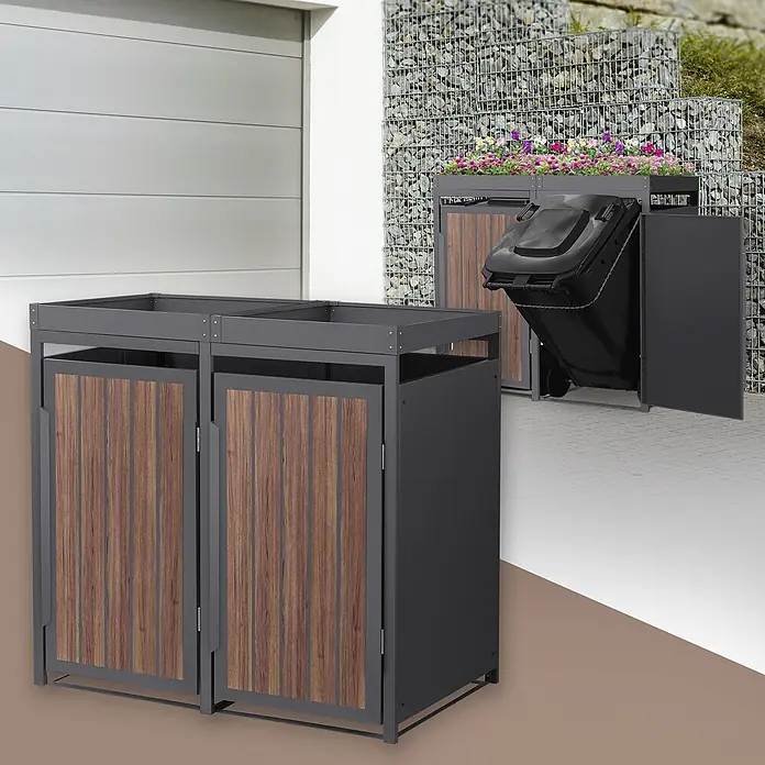 ML-Design Mülltonnenbox 2er 240L mit Pflanzdach Anthrazit-Holzoptik -  - Zweifach-Mülltonnenbox aus dunkelgrauem Metall mit Holztüren im Vordergrund. Einzelne Box im Hintergrund verdeckt eine Mülltonne, oben bepflanzt.