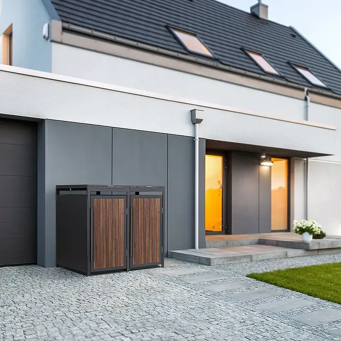 ML-Design Mülltonnenbox 2er 240L Anthrazit-Holzoptik 132x80x120 cm -  - Doppelter Mülltonnenunterstand mit dunklem Metallrahmen und Holztüren vor einem modernen Haus.