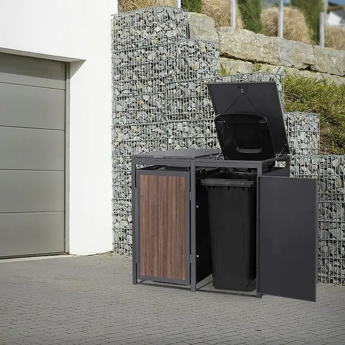 ML-Design Mülltonnenbox 2er 240L Anthrazit-Holzoptik 132x80x120 cm -  - Outdoor-Mülltonnenbox, grauer Rahmen, Türen in Holzoptik und Grau. Deckel offen, schwarze Mülltonnen auf gepflasterter Einfahrt.