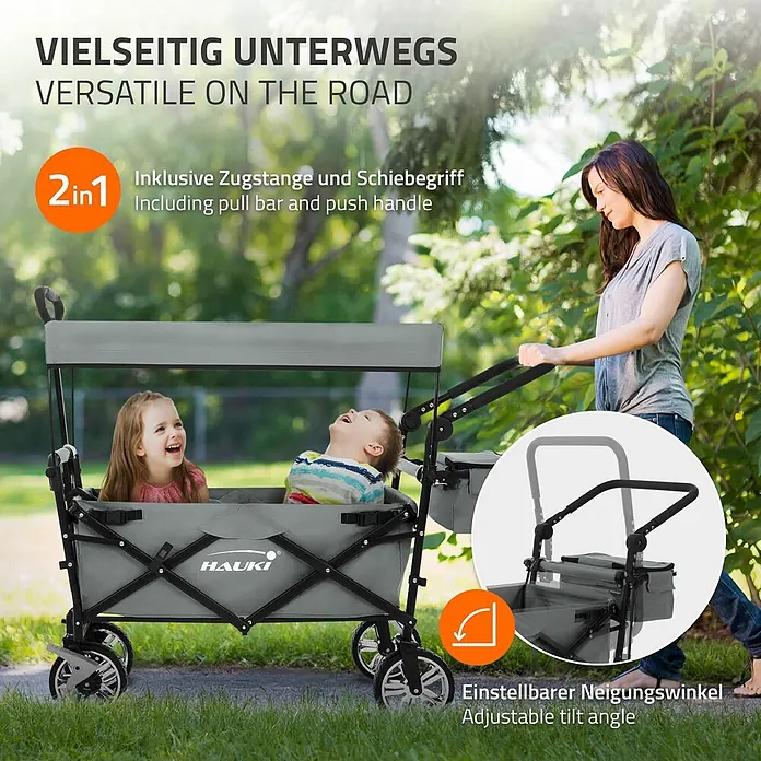 Bollerwagen faltbar mit Dach Grau XXL für Kinder Strand Picknick -  - Grauer Faltwagen mit Verdeck, Kinder fahren mit, von Frau geschoben. Verfügt über 2-in-1-Griff und verstellbare Neigung.