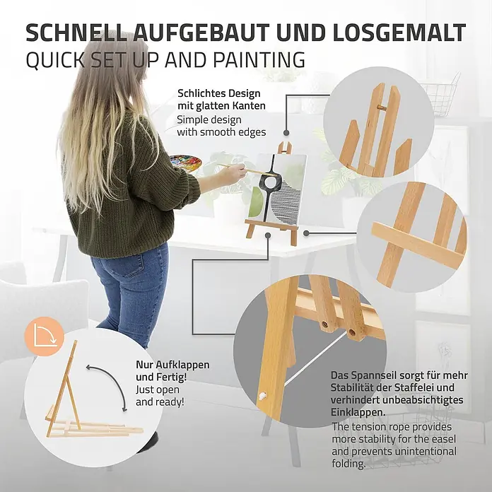 Tischstaffelei klappbar aus Holz verstellbar für Leinwänden bis 40 cm -  - Ein helles Holzstaffelei wird von einer Person beim Malen benutzt. Details zeigen einfaches Design, schnellen Aufbau und Spannseil für Stabilität.